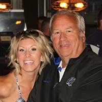 man and woman attending